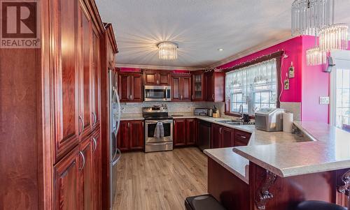 14 Church Road, Pilley'S Island, NL - Indoor Photo Showing Kitchen With Double Sink