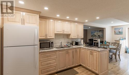 14 Church Road, Pilley'S Island, NL - Indoor Photo Showing Kitchen With Double Sink