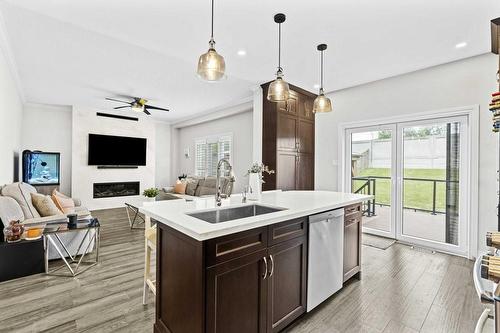 5154 Bird Boulevard, Burlington, ON - Indoor Photo Showing Kitchen With Fireplace