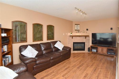 94 Grindstone Way, Waterdown, ON - Indoor Photo Showing Living Room With Fireplace