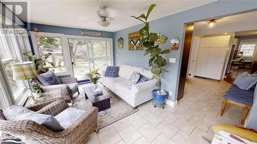 Sun Porch with entry to the Deck - 639 Ravenscliffe Road, Huntsville, ON - Indoor Photo Showing Living Room