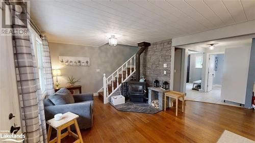 Seating area with Airtight Woodstove - 639 Ravenscliffe Road, Huntsville, ON - Indoor