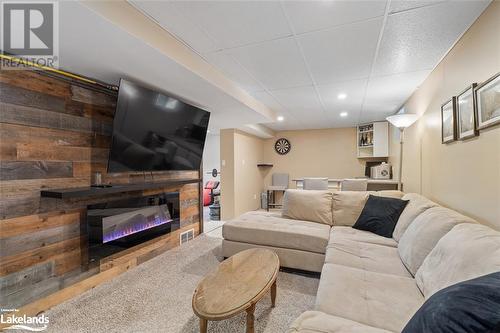 155 Balsam Chutes, Huntsville, ON - Indoor Photo Showing Living Room With Fireplace