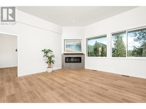 2741 Cedar Ridge Street, Lumby, BC - Indoor With Fireplace