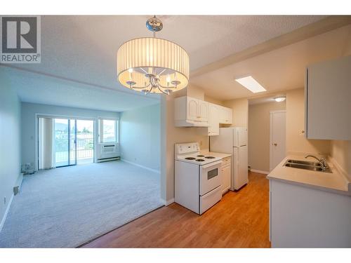 8909 92Nd Avenue Unit# 101, Osoyoos, BC - Indoor Photo Showing Kitchen With Double Sink