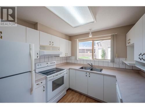 8006 Vedette Drive Unit# 101A, Osoyoos, BC - Indoor Photo Showing Kitchen With Double Sink