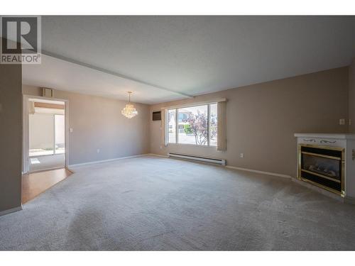 8006 Vedette Drive Unit# 101A, Osoyoos, BC - Indoor With Fireplace