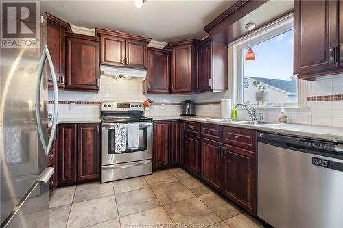 18 Blanchard St, Dieppe, NB - Indoor Photo Showing Kitchen With Double Sink