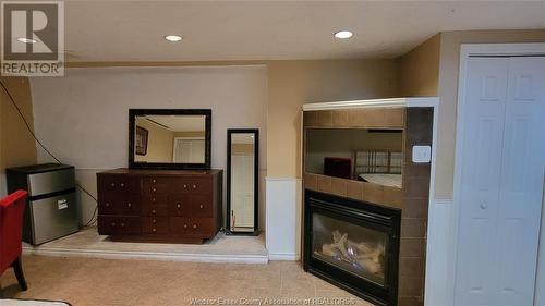 3018 Coram Cres, Windsor, ON - Indoor With Fireplace