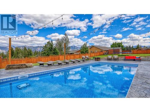 945 Westridge  Way, Invermere, BC - Outdoor With In Ground Pool With Backyard