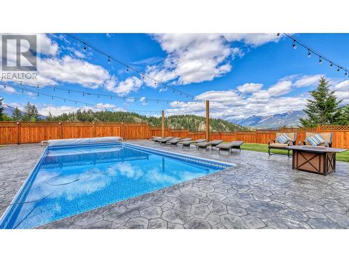 945 Westridge  Way, Invermere, BC - Outdoor With In Ground Pool With Backyard