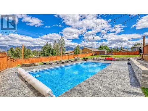 945 Westridge  Way, Invermere, BC - Outdoor With In Ground Pool With Backyard