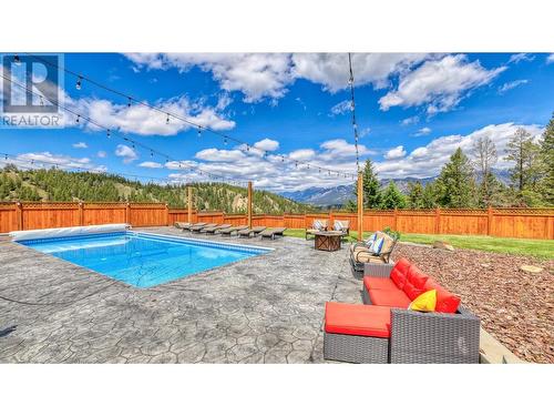 945 Westridge  Way, Invermere, BC - Outdoor With In Ground Pool With Backyard