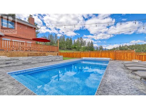 945 Westridge  Way, Invermere, BC - Outdoor With In Ground Pool With Backyard