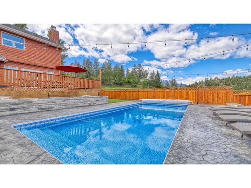 945 Westridge Way, Invermere, BC - Outdoor With In Ground Pool With Backyard