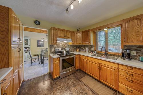 4889 Fairmont Creek Road, Fairmont Hot Springs, BC - Indoor Photo Showing Kitchen With Double Sink