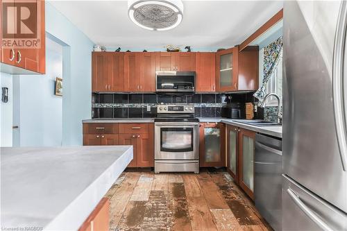 11 Innisfree Drive, Springwater, ON - Indoor Photo Showing Kitchen With Double Sink