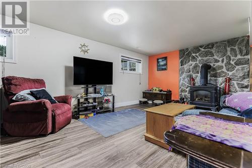 11 Innisfree Drive, Springwater, ON - Indoor Photo Showing Living Room With Fireplace