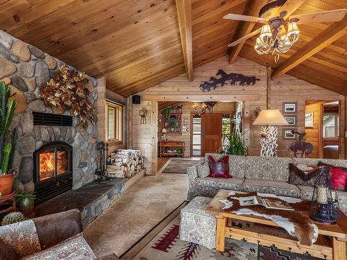 7315 Shertenlib Road, Out Of District, BC - Indoor Photo Showing Living Room With Fireplace