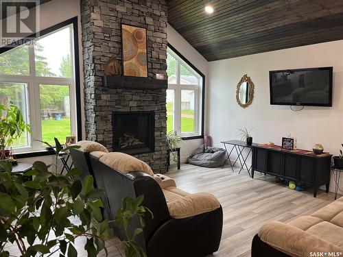 105 4Th Street, Birch Hills, SK - Indoor Photo Showing Living Room With Fireplace