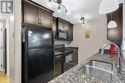 219 1220 Blackfoot Drive, Regina, SK - Indoor Photo Showing Kitchen With Double Sink