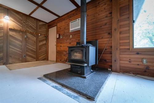 21 Spinnaker Lane, Gimli Rm, MB - Indoor Photo Showing Other Room With Fireplace