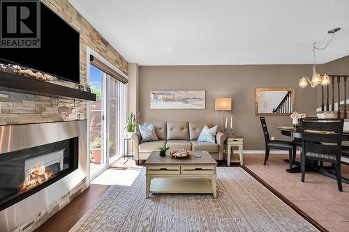 180 Thomas Avenue, Brantford, ON - Indoor Photo Showing Living Room With Fireplace