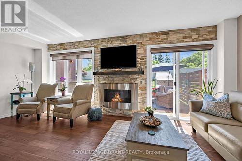 180 Thomas Avenue, Brantford, ON - Indoor Photo Showing Living Room With Fireplace