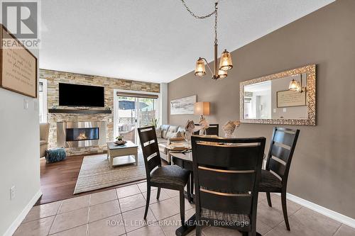 180 Thomas Avenue, Brantford, ON - Indoor Photo Showing Dining Room With Fireplace