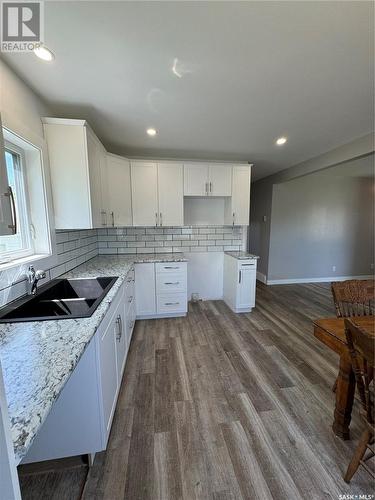 37 1St Avenue Sw, Norquay, SK - Indoor Photo Showing Kitchen With Double Sink