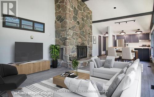 15 North Taylor Road, Kawartha Lakes, ON - Indoor Photo Showing Living Room With Fireplace