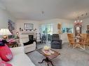 210-73 Gorge Rd West, Saanich, BC  - Indoor Photo Showing Living Room With Fireplace 