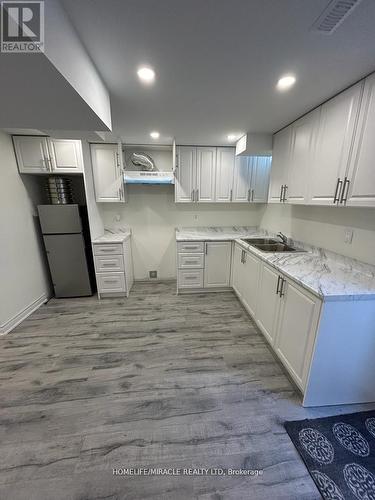 91 Sugarhill Drive W, Brampton, ON - Indoor Photo Showing Kitchen With Double Sink