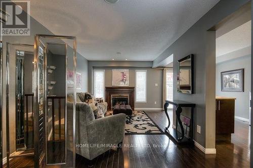 167 Sims Estate Drive, Kitchener, ON - Indoor Photo Showing Living Room With Fireplace