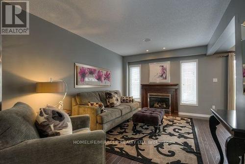 167 Sims Estate Drive, Kitchener, ON - Indoor Photo Showing Living Room With Fireplace