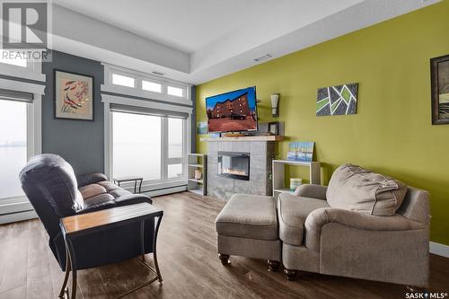 302 515 La Ronge Avenue, La Ronge, SK - Indoor Photo Showing Living Room With Fireplace