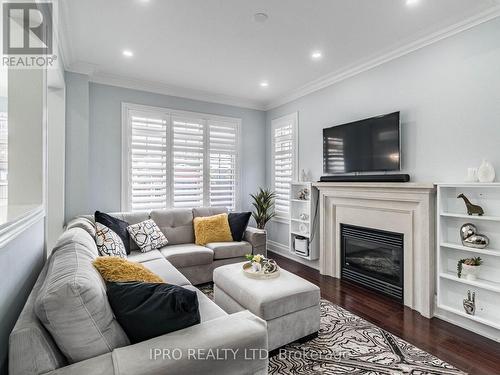 42 Swancreek Court, Brampton, ON - Indoor Photo Showing Living Room With Fireplace