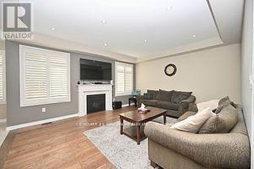 31 Mincing Trail, Brampton, ON - Indoor Photo Showing Living Room With Fireplace