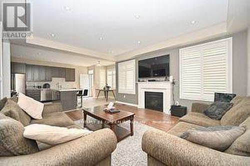 31 Mincing Trail, Brampton, ON - Indoor Photo Showing Living Room With Fireplace
