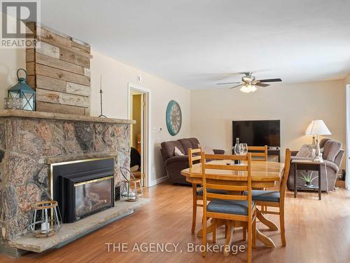 155 Balsam Chutes W, Huntsville, ON - Indoor Photo Showing Living Room With Fireplace