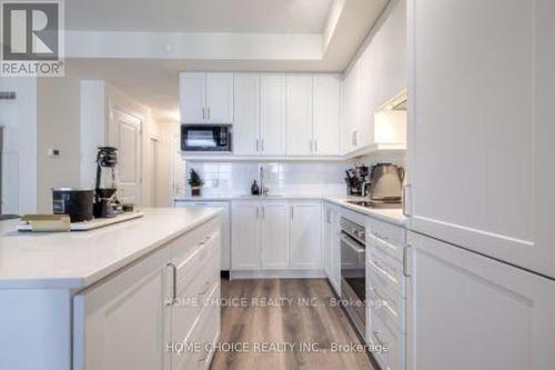 1010 - 9075 Jane Street, Vaughan (Concord), ON - Indoor Photo Showing Kitchen