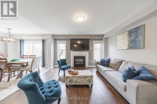 19 Hoard Avenue N, New Tecumseth, ON - Indoor Photo Showing Living Room With Fireplace