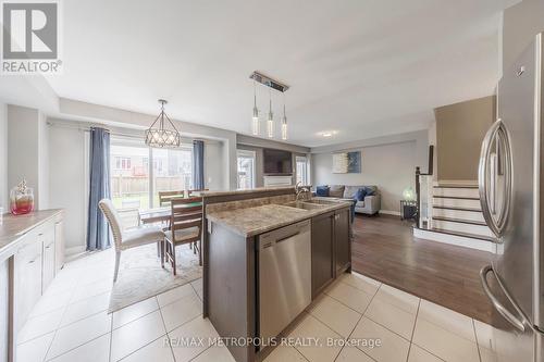 19 Hoard Avenue N, New Tecumseth, ON - Indoor Photo Showing Kitchen With Double Sink