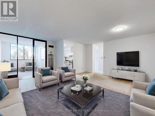 330 - 25 Bamburgh Circle, Toronto, ON - Indoor Photo Showing Living Room