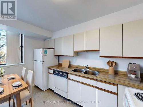 330 - 25 Bamburgh Circle, Toronto, ON - Indoor Photo Showing Kitchen With Double Sink