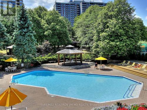 330 - 25 Bamburgh Circle, Toronto, ON - Outdoor With In Ground Pool With Backyard