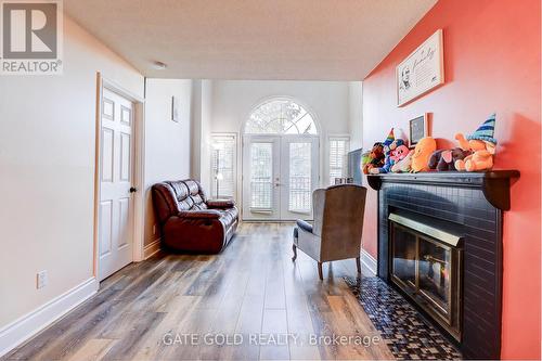 H3 - 1661 Nash Road, Clarington, ON - Indoor Photo Showing Living Room With Fireplace