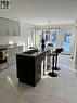 23 Owens Road, New Tecumseth, ON  - Indoor Photo Showing Kitchen With Double Sink 