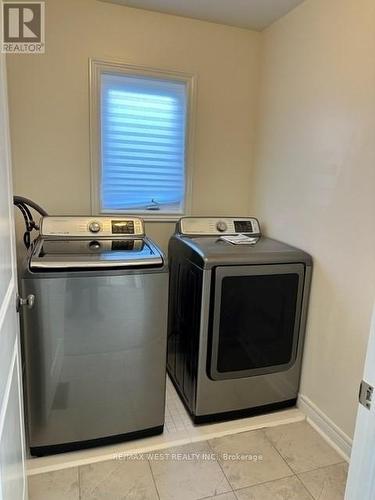 23 Owens Road, New Tecumseth, ON - Indoor Photo Showing Laundry Room