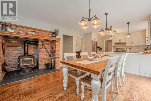1225 Graham Road, Gravenhurst, ON - Indoor Photo Showing Dining Room With Fireplace